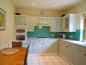 Kitchen of cottage with pool