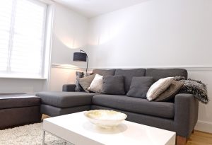 Comfy sofa in this short term apartment